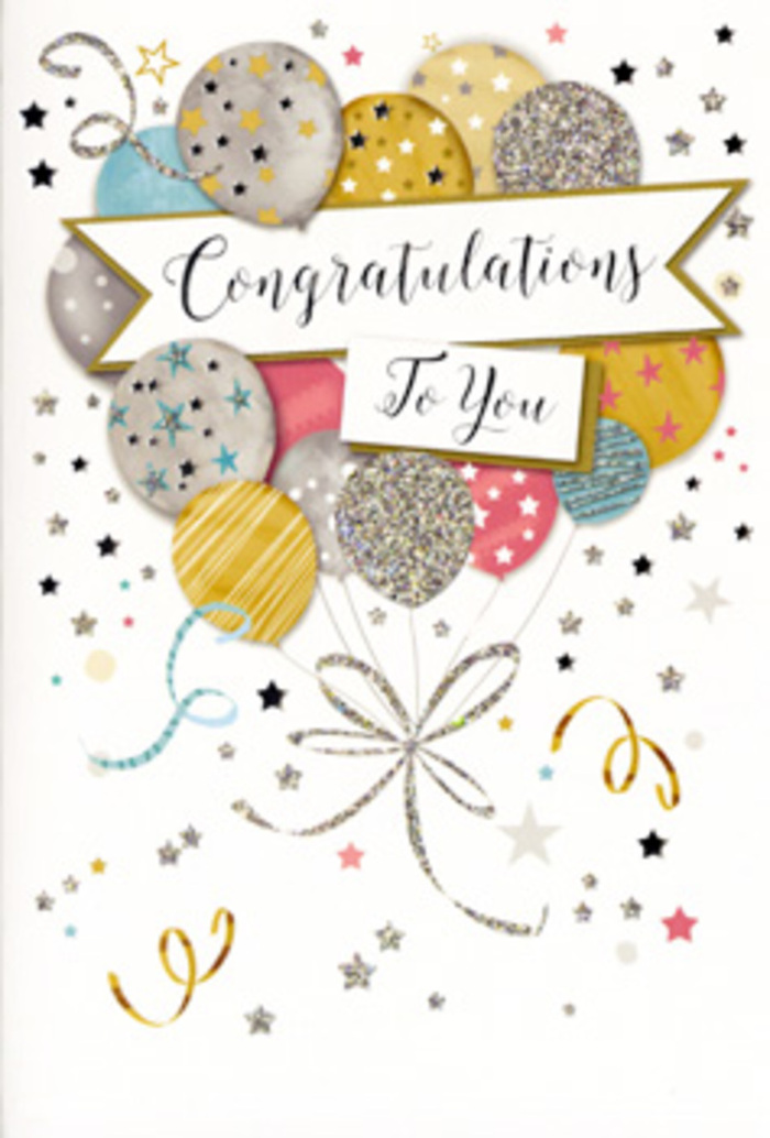 A refined congratulations card is shown in close detail, its design echoing the feeling of a well-planned celebration in the heart of Tulse Hill. The illustration centres on a floating arrangement of balloons, as if someone has just released them above a party table. Each balloon is softly rounded and carefully shaded, painted in harmonious hues of gold, silver, champagne, dusty pink, sky blue, and muted grey. Some are brushed with fine glitter, others patterned with narrow stripes, tiny stars, or scattered dots, creating subtle variations that make the cluster feel lively but never chaotic. Slender, curling strings in gold and silver tones trail downward, meeting in a graceful knot that visually anchors the image like a bouquet tied by an expert florist. A broad banner unfurls across the middle of the balloons, carrying the words "Congratulations To You" in ornate, sweeping script that suggests care and sincerity. Behind and around the central motif, the card's soft background is gently dusted with star shapes, tiny metallic flecks, and loose, twisting ribbons, giving the impression of confetti gently drifting through the air at a celebration near Brockwell Park or along Norwood Road. There is an implied texture to the design, hinting at raised glitter catching the light and smooth, glossy lettering you could feel under your fingertips. The overall mood is joyful yet polished, ideal for pairing with a fresh floral delivery to mark promotions, graduations, new homes, or any proud moment being celebrated in Tulse Hill and the surrounding neighbourhoods.