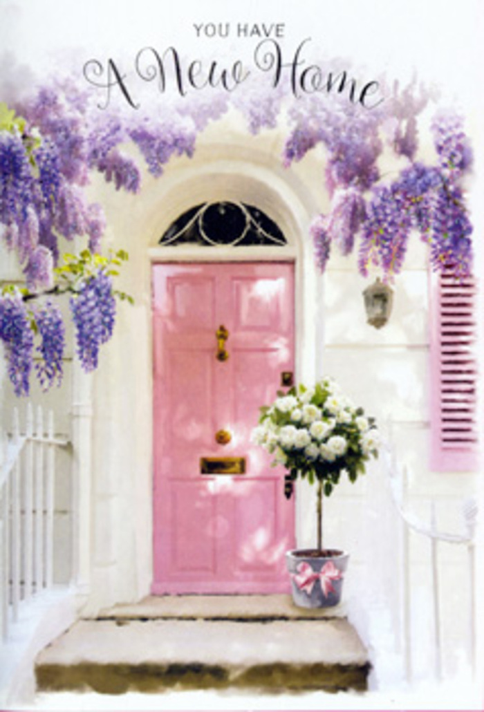 A sun-kissed entranceway in Tulse Hill captures the emotional pause between closing one life chapter and opening another. The scene centres on a softly painted pink front door whose pastel tone seems to hold the warmth of a long, gentle afternoon. Its surface is smooth yet not glossy, giving the feeling of a carefully refreshed home rather than something showy. Framing this door, the wall is whitewashed to a chalky, matte finish that reflects light in a quiet, diffused way, while a single shutter in a coordinating hue hints at a tidy, welcoming interior beyond. Overhead, wisteria coils and tumbles in full, fragrant drifts, heavy with lavender and dusky purple blooms, each cluster formed of dozens of tiny petals that catch the breeze. The hanging racemes gather around the door like a natural arch commonly glimpsed along the residential streets near Brockwell Park and the gentle slopes of Palace Road, where older houses carry their gardens like proud, living ornaments. On the doorstep, a rustic tin bucket in soft grey holds a generous gathering of velvety white and cream roses, their petals layered like silk, opened just enough to suggest both freshness and longevity. Wisps of soft green foliage weave between them, adding texture and subtle contrast. Around the bucket's base, a pale pink ribbon is knotted in a graceful bow, its loose ends trailing slightly across the step like a finishing brushstroke in a painting. Everything here - the pastel tones, the interplay of sunlight and shadow, the contrast of sturdy metal with delicate flowers - feels designed to welcome someone into a new home. It is a scene a local Tulse Hill florist might create for clients settling near Norwood Road or Leigham Vale: a tender housewarming gesture that says, without words, you are home now, and this place is ready to hold your stories.